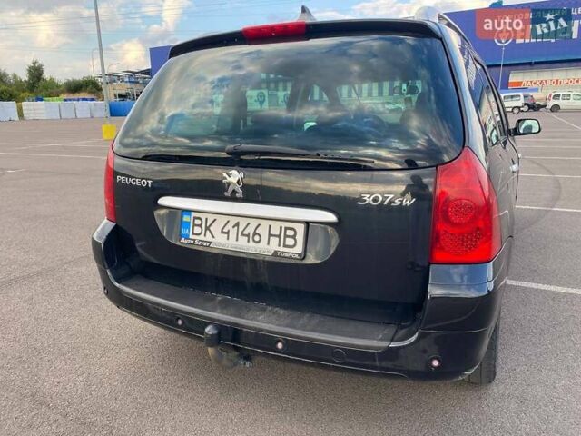 Черный Пежо 307, объемом двигателя 1.59 л и пробегом 303 тыс. км за 3900 $, фото 4 на Automoto.ua