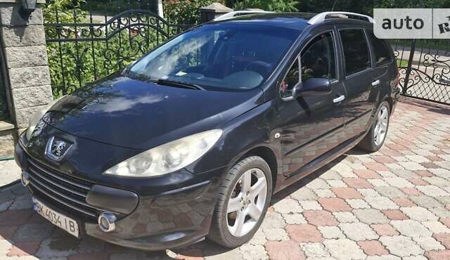 Чорний Пежо 307, об'ємом двигуна 1.6 л та пробігом 280 тис. км за 4300 $, фото 6 на Automoto.ua