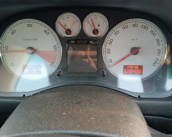 Черный Пежо 307, объемом двигателя 1.56 л и пробегом 328 тыс. км за 4700 $, фото 1 на Automoto.ua