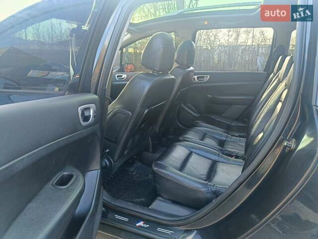 Черный Пежо 307, объемом двигателя 2 л и пробегом 253 тыс. км за 5000 $, фото 7 на Automoto.ua