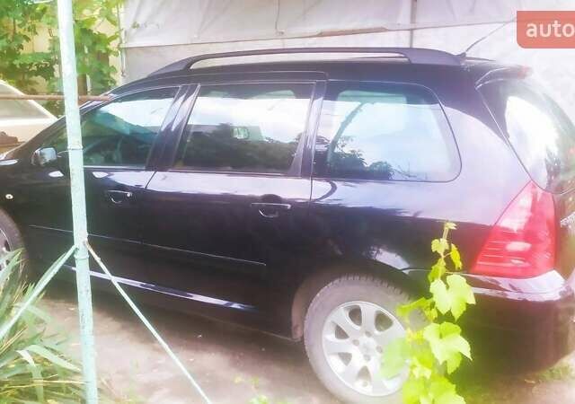 Черный Пежо 307, объемом двигателя 1.6 л и пробегом 253 тыс. км за 4800 $, фото 11 на Automoto.ua