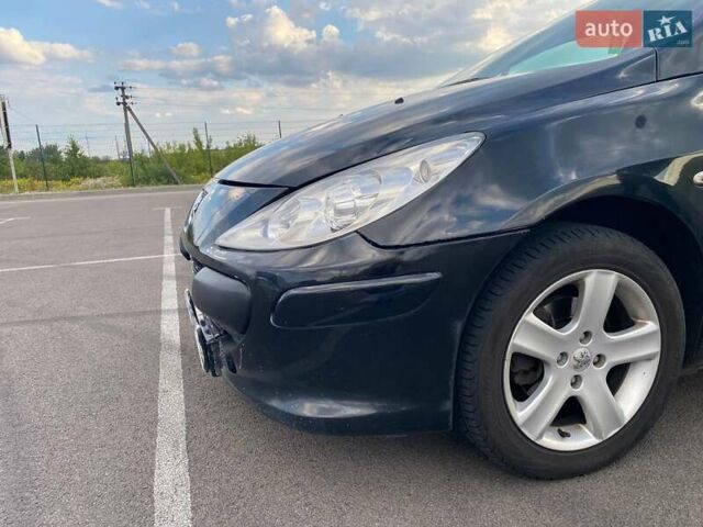 Черный Пежо 307, объемом двигателя 1.59 л и пробегом 303 тыс. км за 3900 $, фото 12 на Automoto.ua