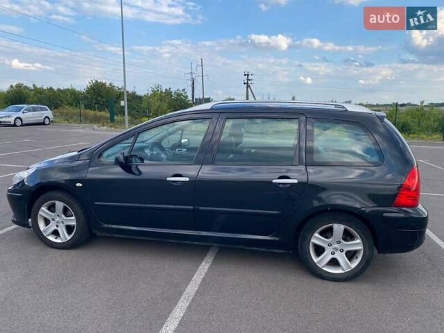 Черный Пежо 307, объемом двигателя 1.59 л и пробегом 303 тыс. км за 3900 $, фото 3 на Automoto.ua