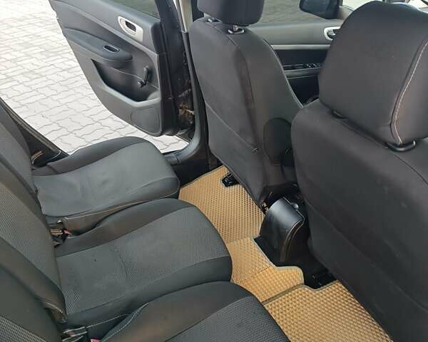 Черный Пежо 307, объемом двигателя 1.56 л и пробегом 328 тыс. км за 4700 $, фото 5 на Automoto.ua