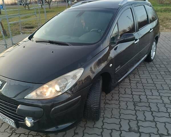 Черный Пежо 307, объемом двигателя 1.56 л и пробегом 328 тыс. км за 4700 $, фото 2 на Automoto.ua