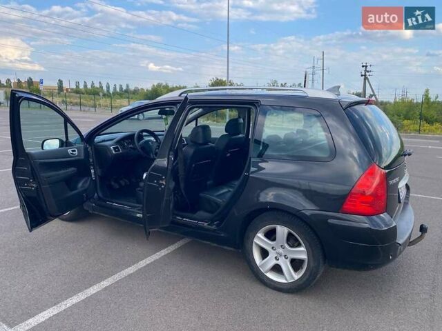 Черный Пежо 307, объемом двигателя 1.59 л и пробегом 303 тыс. км за 3900 $, фото 7 на Automoto.ua