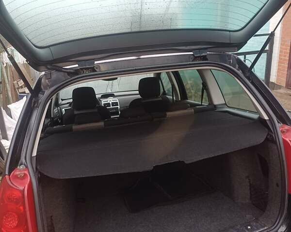 Черный Пежо 307, объемом двигателя 1.6 л и пробегом 264 тыс. км за 5000 $, фото 3 на Automoto.ua