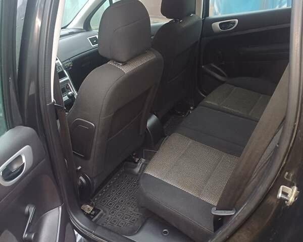 Черный Пежо 307, объемом двигателя 1.6 л и пробегом 264 тыс. км за 5000 $, фото 4 на Automoto.ua