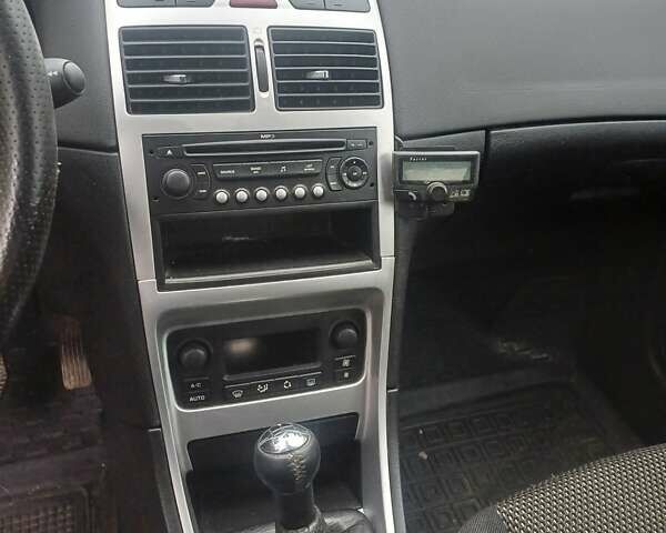 Черный Пежо 307, объемом двигателя 1.6 л и пробегом 264 тыс. км за 5000 $, фото 7 на Automoto.ua