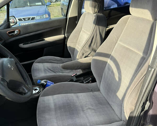 Фіолетовий Пежо 307, об'ємом двигуна 2 л та пробігом 262 тис. км за 3600 $, фото 9 на Automoto.ua