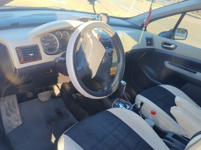 Фиолетовый Пежо 307, объемом двигателя 2 л и пробегом 250 тыс. км за 3499 $, фото 6 на Automoto.ua