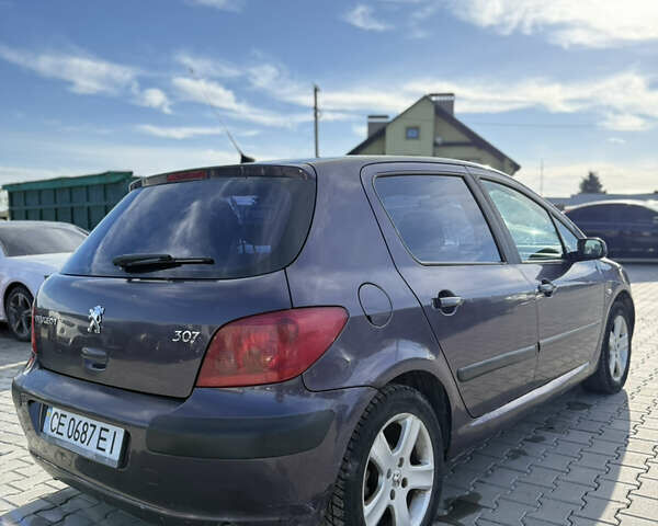 Фіолетовий Пежо 307, об'ємом двигуна 2 л та пробігом 262 тис. км за 3600 $, фото 5 на Automoto.ua