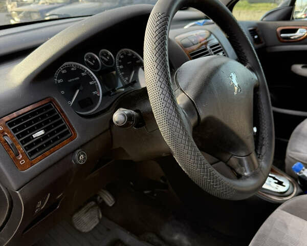 Фіолетовий Пежо 307, об'ємом двигуна 2 л та пробігом 262 тис. км за 3600 $, фото 7 на Automoto.ua