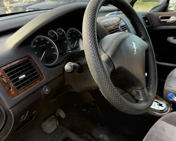 Фіолетовий Пежо 307, об'ємом двигуна 2 л та пробігом 262 тис. км за 3600 $, фото 9 на Automoto.ua