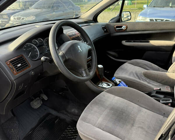 Фіолетовий Пежо 307, об'ємом двигуна 2 л та пробігом 262 тис. км за 3600 $, фото 8 на Automoto.ua