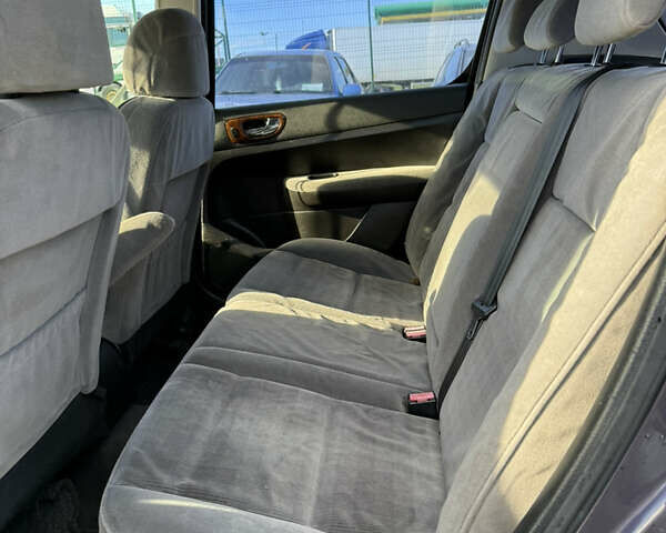 Фіолетовий Пежо 307, об'ємом двигуна 2 л та пробігом 262 тис. км за 3600 $, фото 13 на Automoto.ua