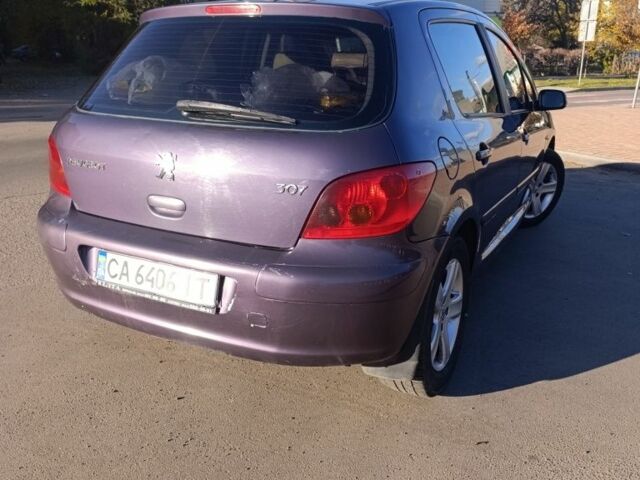 Фиолетовый Пежо 307, объемом двигателя 2 л и пробегом 250 тыс. км за 3499 $, фото 2 на Automoto.ua