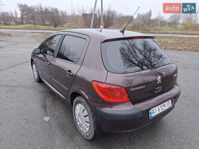 Фиолетовый Пежо 307, объемом двигателя 1.59 л и пробегом 230 тыс. км за 4000 $, фото 7 на Automoto.ua