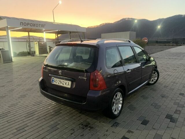 Фиолетовый Пежо 307, объемом двигателя 2 л и пробегом 309 тыс. км за 3000 $, фото 5 на Automoto.ua