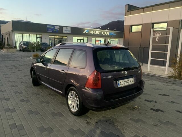 Фиолетовый Пежо 307, объемом двигателя 2 л и пробегом 309 тыс. км за 3000 $, фото 4 на Automoto.ua