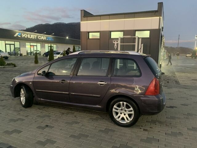 Фиолетовый Пежо 307, объемом двигателя 2 л и пробегом 309 тыс. км за 3000 $, фото 3 на Automoto.ua