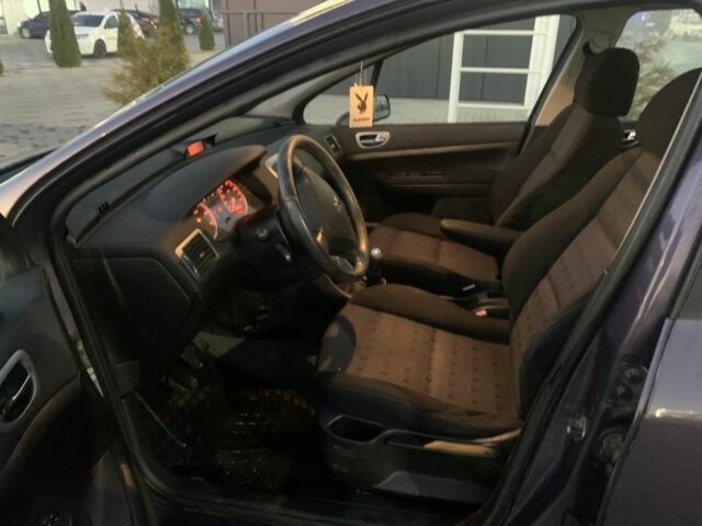 Фиолетовый Пежо 307, объемом двигателя 2 л и пробегом 309 тыс. км за 3000 $, фото 12 на Automoto.ua