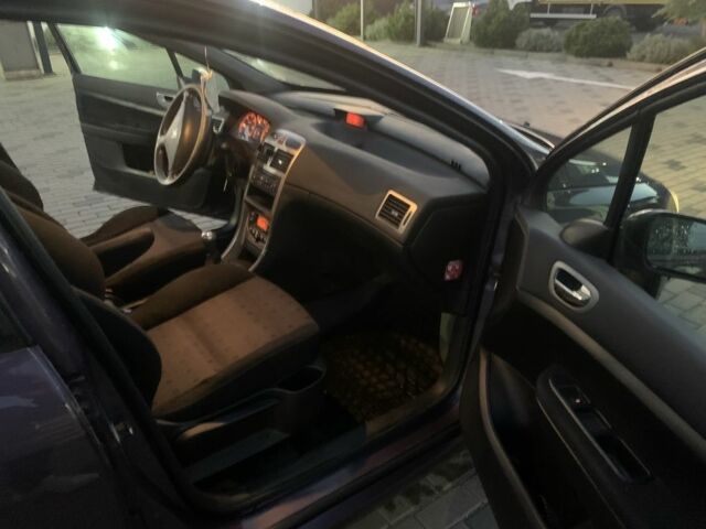 Фиолетовый Пежо 307, объемом двигателя 2 л и пробегом 309 тыс. км за 3000 $, фото 15 на Automoto.ua