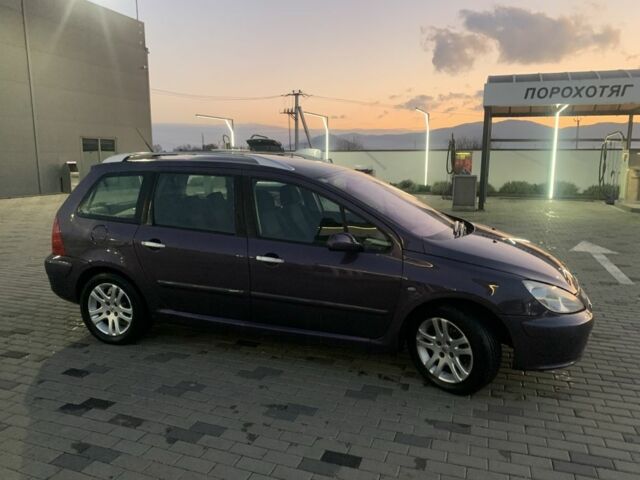 Фиолетовый Пежо 307, объемом двигателя 2 л и пробегом 309 тыс. км за 3000 $, фото 7 на Automoto.ua