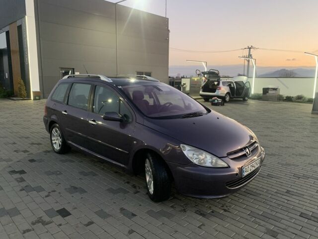 Фиолетовый Пежо 307, объемом двигателя 2 л и пробегом 309 тыс. км за 3000 $, фото 8 на Automoto.ua