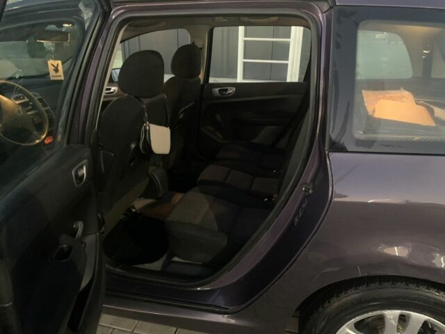 Фиолетовый Пежо 307, объемом двигателя 2 л и пробегом 309 тыс. км за 3000 $, фото 13 на Automoto.ua