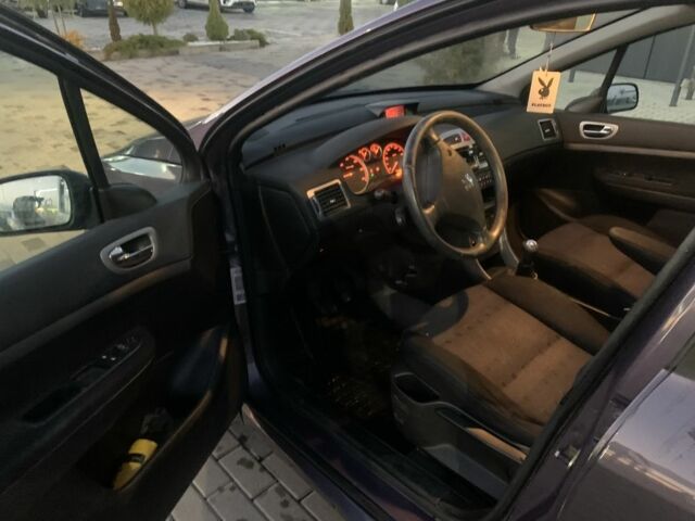 Фиолетовый Пежо 307, объемом двигателя 2 л и пробегом 309 тыс. км за 3000 $, фото 11 на Automoto.ua