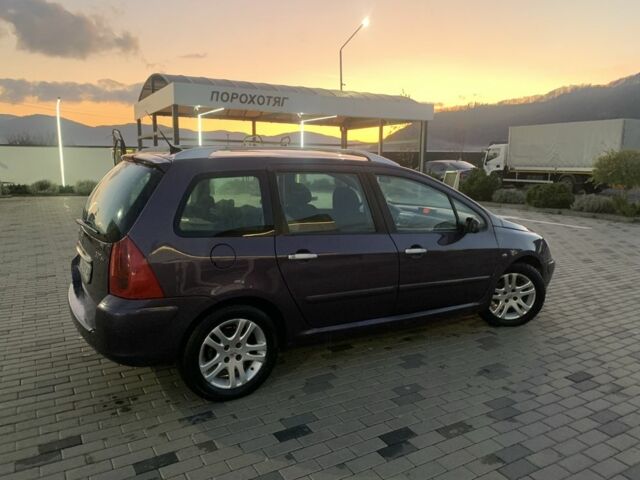 Фиолетовый Пежо 307, объемом двигателя 2 л и пробегом 309 тыс. км за 3000 $, фото 6 на Automoto.ua
