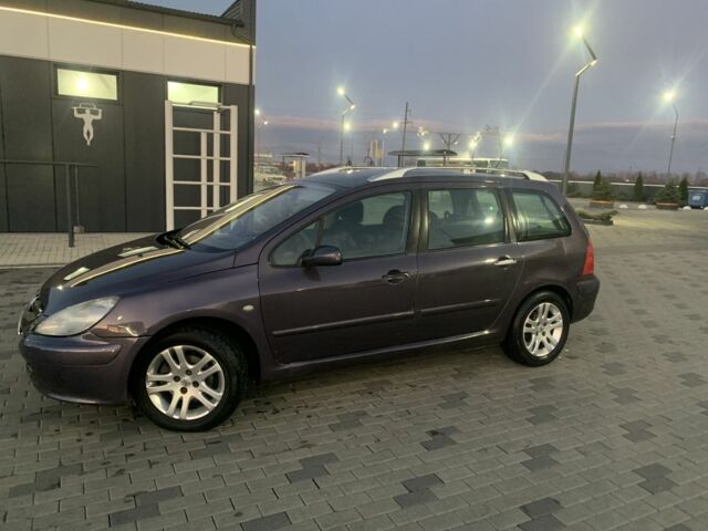 Фиолетовый Пежо 307, объемом двигателя 2 л и пробегом 309 тыс. км за 3000 $, фото 1 на Automoto.ua