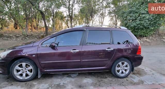 Пежо 307 2006 в Черновцах на Automoto.ua Фиолетовый Пежо 307, объемом двигателя 2 л и пробегом 255 тыс. км за 4700 $, фото 4 на Automoto.ua