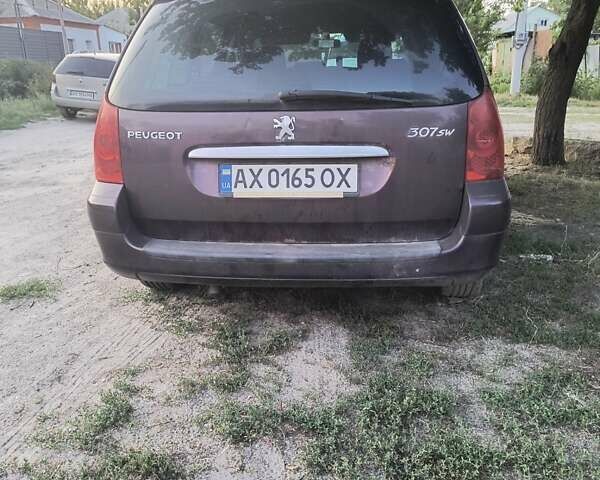 Фиолетовый Пежо 307, объемом двигателя 2 л и пробегом 200 тыс. км за 4500 $, фото 7 на Automoto.ua
