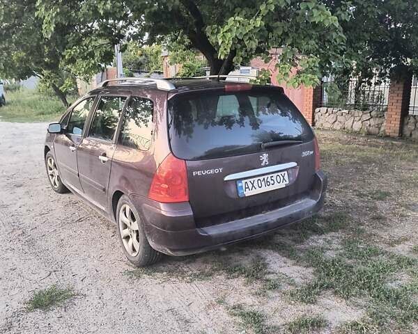 Фиолетовый Пежо 307, объемом двигателя 2 л и пробегом 200 тыс. км за 4500 $, фото 8 на Automoto.ua