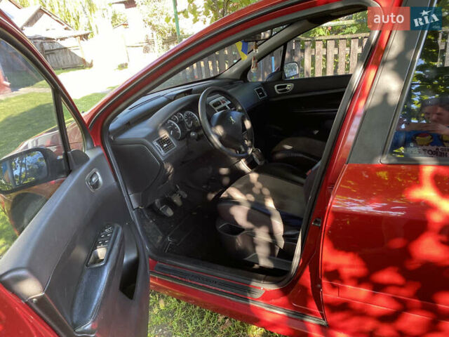 Красный Пежо 307, объемом двигателя 2 л и пробегом 338 тыс. км за 3550 $, фото 7 на Automoto.ua