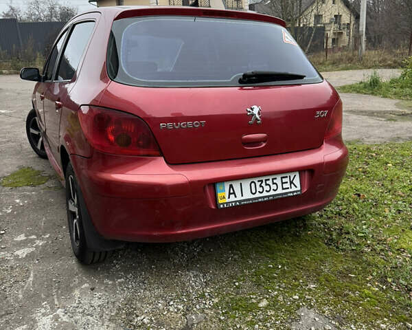 Красный Пежо 307, объемом двигателя 1.59 л и пробегом 155 тыс. км за 3900 $, фото 4 на Automoto.ua