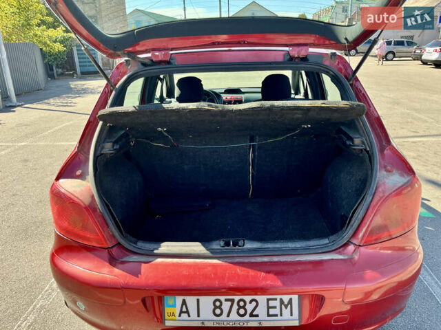 Красный Пежо 307, объемом двигателя 1.36 л и пробегом 180 тыс. км за 1999 $, фото 12 на Automoto.ua