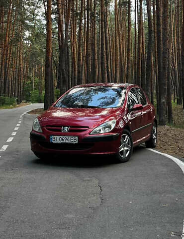 Красный Пежо 307, объемом двигателя 1.4 л и пробегом 199 тыс. км за 2900 $, фото 2 на Automoto.ua