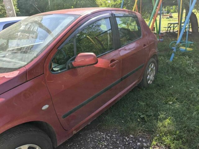 Красный Пежо 307, объемом двигателя 1.4 л и пробегом 277 тыс. км за 3000 $, фото 13 на Automoto.ua