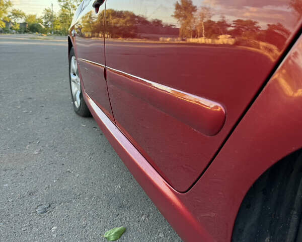 Красный Пежо 307, объемом двигателя 2 л и пробегом 127 тыс. км за 4200 $, фото 7 на Automoto.ua