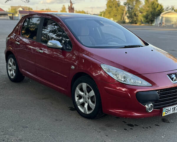 Красный Пежо 307, объемом двигателя 2 л и пробегом 127 тыс. км за 4200 $, фото 1 на Automoto.ua