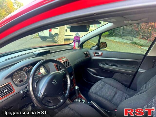 Красный Пежо 307, объемом двигателя 2 л и пробегом 215 тыс. км за 4299 $, фото 8 на Automoto.ua