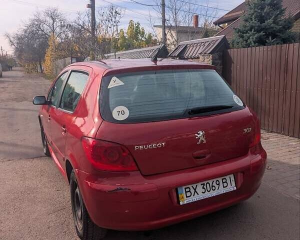 Червоний Пежо 307, об'ємом двигуна 2 л та пробігом 110 тис. км за 4200 $, фото 5 на Automoto.ua