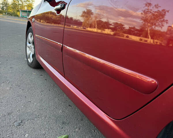 Красный Пежо 307, объемом двигателя 2 л и пробегом 127 тыс. км за 4200 $, фото 8 на Automoto.ua