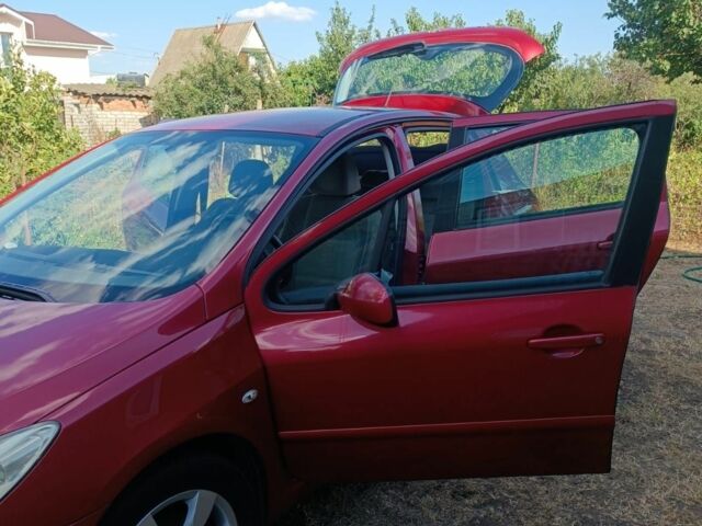 Красный Пежо 307, объемом двигателя 2 л и пробегом 159 тыс. км за 5000 $, фото 6 на Automoto.ua