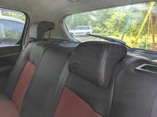 Красный Пежо 307, объемом двигателя 1.4 л и пробегом 277 тыс. км за 3000 $, фото 10 на Automoto.ua