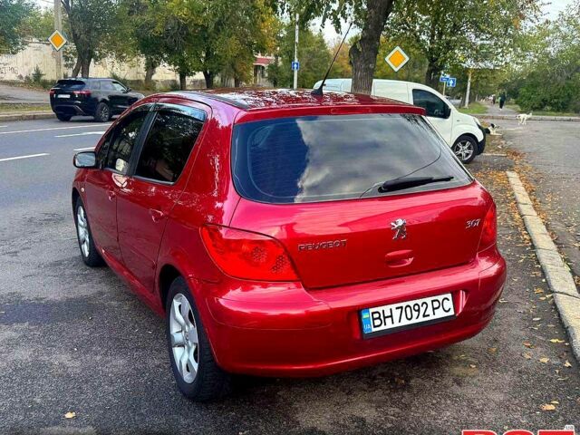 Красный Пежо 307, объемом двигателя 2 л и пробегом 215 тыс. км за 4299 $, фото 3 на Automoto.ua