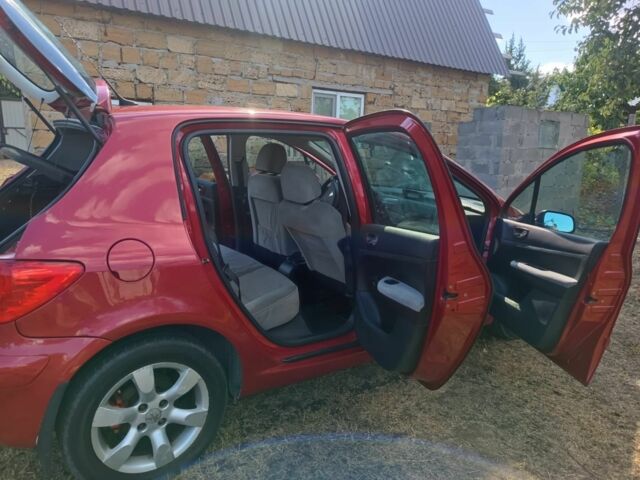 Красный Пежо 307, объемом двигателя 2 л и пробегом 159 тыс. км за 5000 $, фото 5 на Automoto.ua